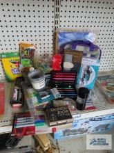 Stationary supplies, colored pencils, sharpies, rubber bands, compass and protractor set, and etc