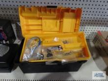 Plastic toolbox with various computer parts and pieces