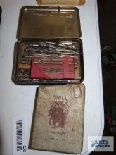 Drill bits and drill bit cases