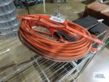 Heavy duty extension cord with cord holder