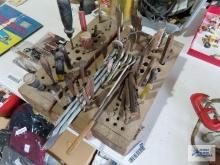 Drill bits, nail sets, chisels, and homemade wooden holders