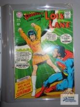 Two Superman DC National comic books including Superman's Girlfriend Lois Lane and Wonder Woman.