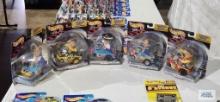 Five Hot Wheels Racing Radical Rides NASCAR Edition cars, new in packages