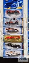 One 2000 CD Customs series Hot Wheels car, two 2000 series Tony Hawk Skate series Hot Wheels cars,