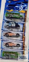Five 2001 Fossil Fuel series Hot Wheels cars, new in packages. not complete