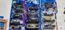 Variety of new Hot Wheels in packages including Red Line, Team Jet Rides, Pop-offs, Battle Force 5