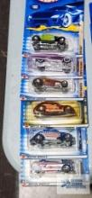 Three of the 2002 Hot Rod Magazine series Hot Wheels cars and three of the 2002 Star Spangled series