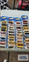 Forty 2000 Hot Wheels cars, new in packages