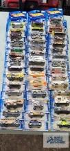 Forty-one 2001 Hot Wheels cars, new in packages