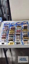 Thirty-Eight 2002 Hot Wheels cars, new in packages