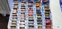 Fifty-one 2002 First Editions Hot Wheels cars, new in packages