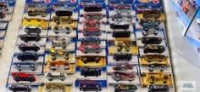 Forty-four 1999 and 2000 Hot Wheels cars, new in packages