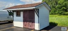 12' 3" long by 8' 3" wide by 9' tall Shed with 3' 6-1/2" overhang on front. 11' 9-1/2" total width