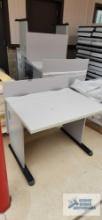 Four formica top computer desks. 3' by 2'-5". Forklift will be available for loading.
