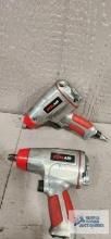 Two Exelair 1/2" impact wrenches