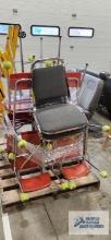 Variety of classroom chairs and two padded chairs