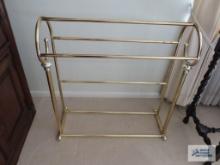 Brass finish quilt rack.
