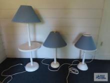 Tray table floor lamp with two matching table lamps.