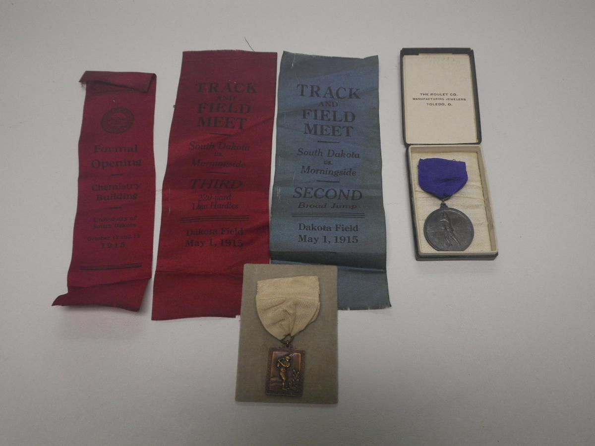 Golf Medals & 1915 University of South Dakota Track & Field ribbons