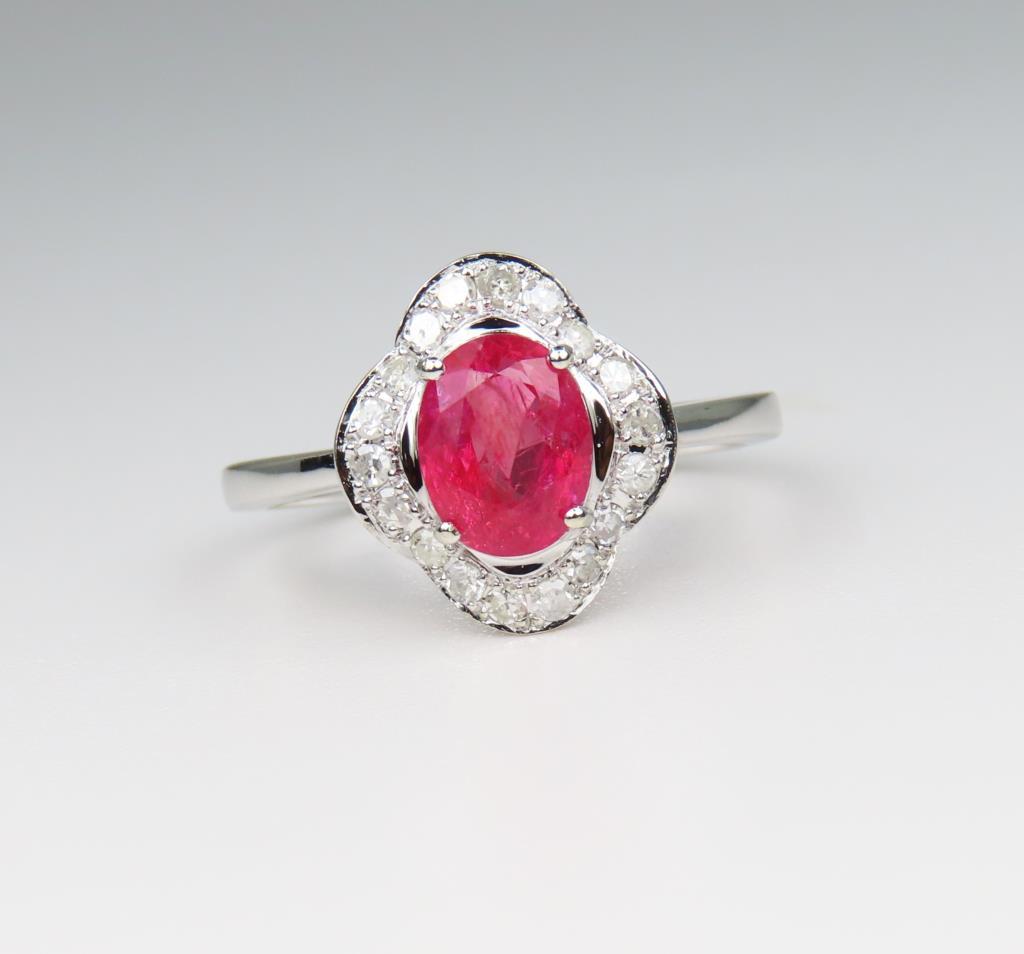 Elegant Orangy-Pink Sapphire and Diamond Ring
