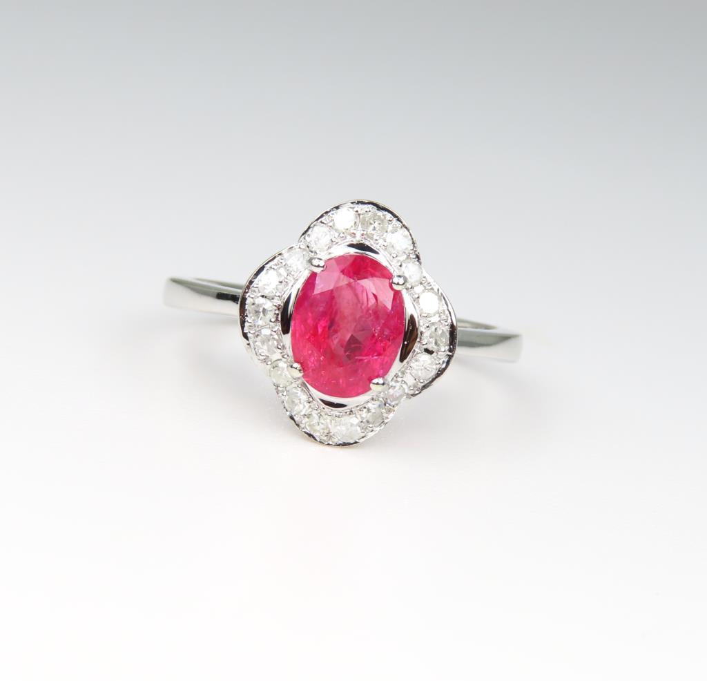 Elegant Orangy-Pink Sapphire and Diamond Ring