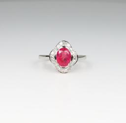 Elegant Orangy-Pink Sapphire and Diamond Ring