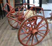 Antique Fire Hose & Hand-Drawn Cart.