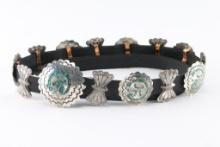 Inlaid Concho Belt.