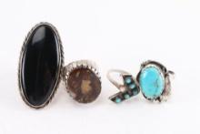 Lot of 4 Sterling Silver Rings.