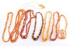 Lot of 8 Amber Necklaces.