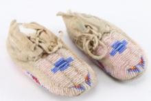 Pair of Beaded Childs Moccasins.
