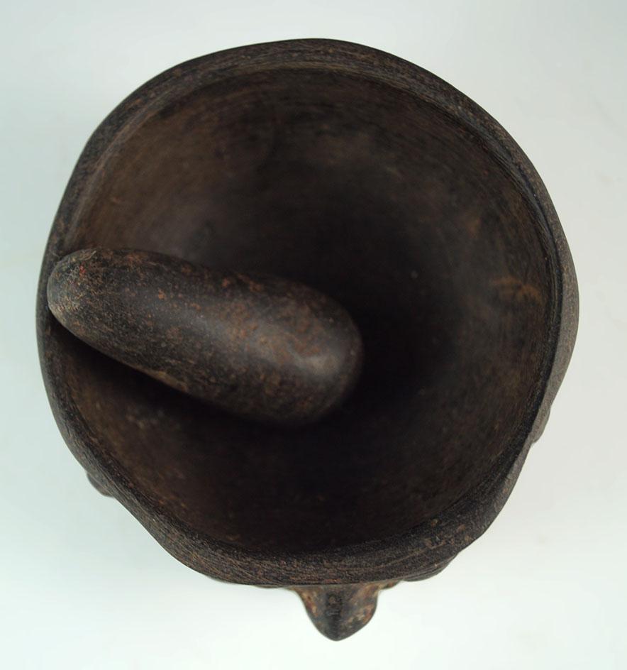 Chavin culture medicine cup with 2 faces and original pestle. Found in Peru. Circa 800 BC.