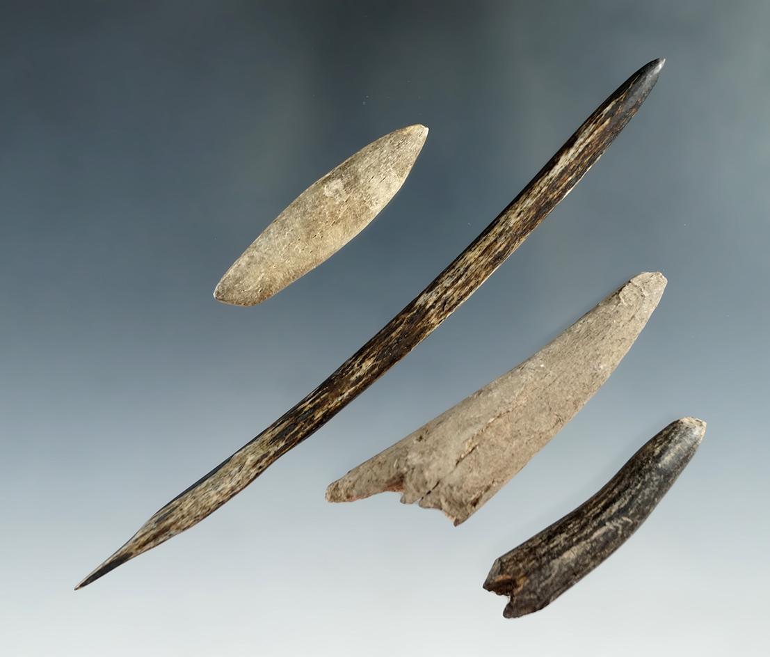 Set of four bone and antler projectiles and tools found at a site in Kentucky. Largest is 5 1/8".