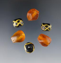 6 rare Beads. large amber faceted and large "Roman" beads. White Springs Site in Geneva, NY