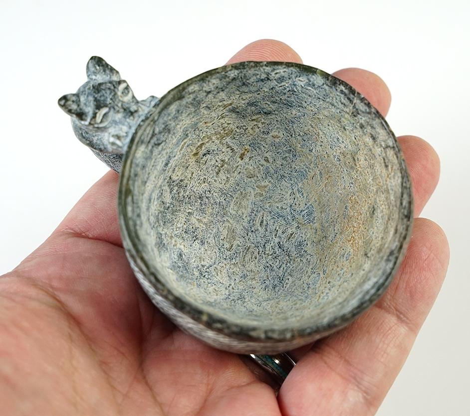 3" long x 1 1/4" tall stone Cup featuring a Canine Effigy Handle recovered in Southeast Asia.