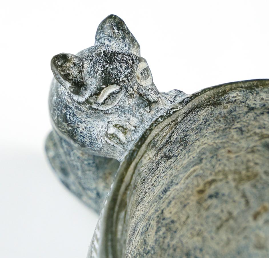 3" long x 1 1/4" tall stone Cup featuring a Canine Effigy Handle recovered in Southeast Asia.