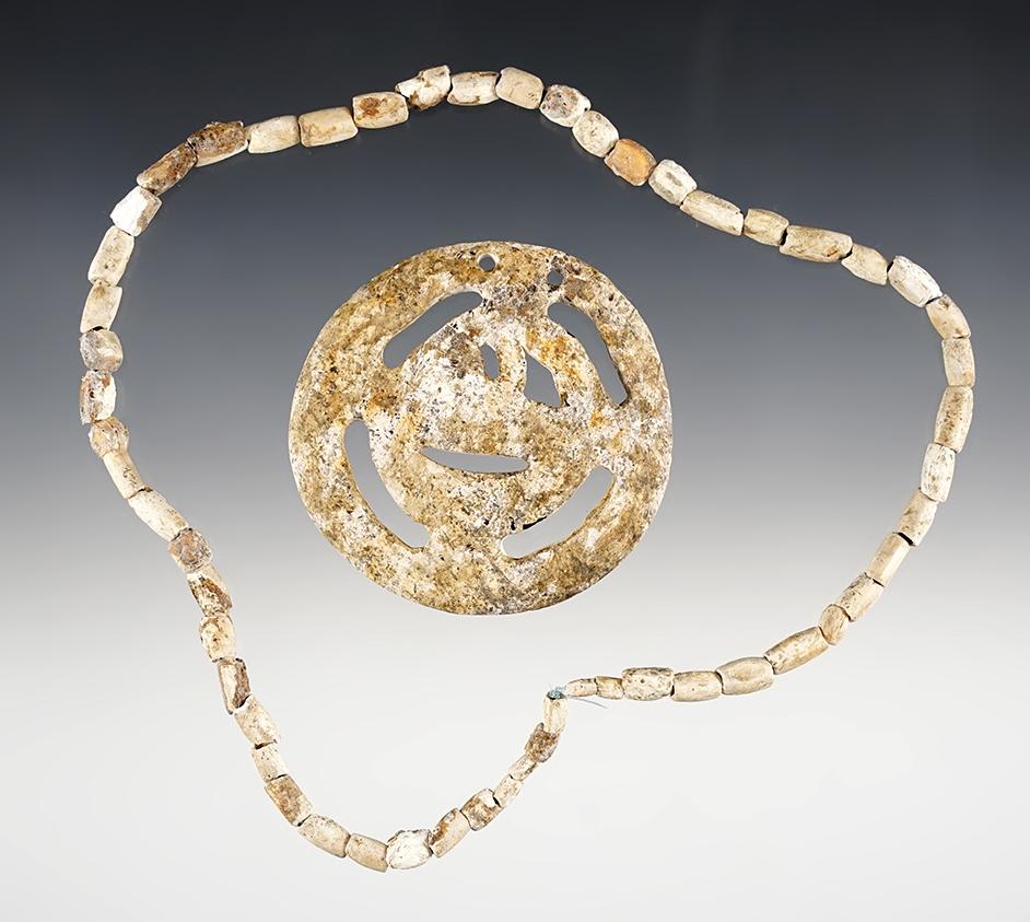 2 9/16" x 2 1/2" Mississippian Rattlesnake Shell Gorget- Marine Shell and a 16 1/2" shell beads.