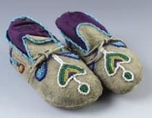 Pair of nicely beaded 4 1/2" long Vintage Childs Moccasins.