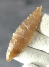 Outstanding 2 3/8" Serrated Leaf Point made from translucent material. Found in New Mexico.