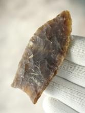 Thin 2 7/8" Paleo Plainview made from Knife River Flint. Found in South Dakota.