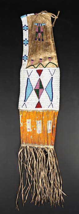 Circa 1880's Sioux or Cheyenne Pipe Bag that is 25" long. No bead loss. Very collectible!