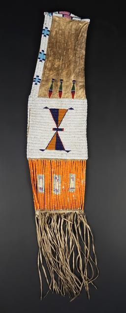 Circa 1880's Sioux or Cheyenne Pipe Bag that is 25" long. No bead loss. Very collectible!