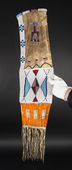Circa 1880's Sioux or Cheyenne Pipe Bag that is 25" long. No bead loss. Very collectible!