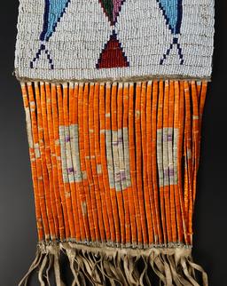 Circa 1880's Sioux or Cheyenne Pipe Bag that is 25" long. No bead loss. Very collectible!