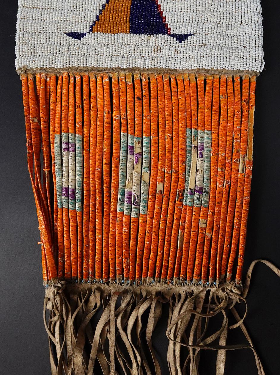 Circa 1880's Sioux or Cheyenne Pipe Bag that is 25" long. No bead loss. Very collectible!
