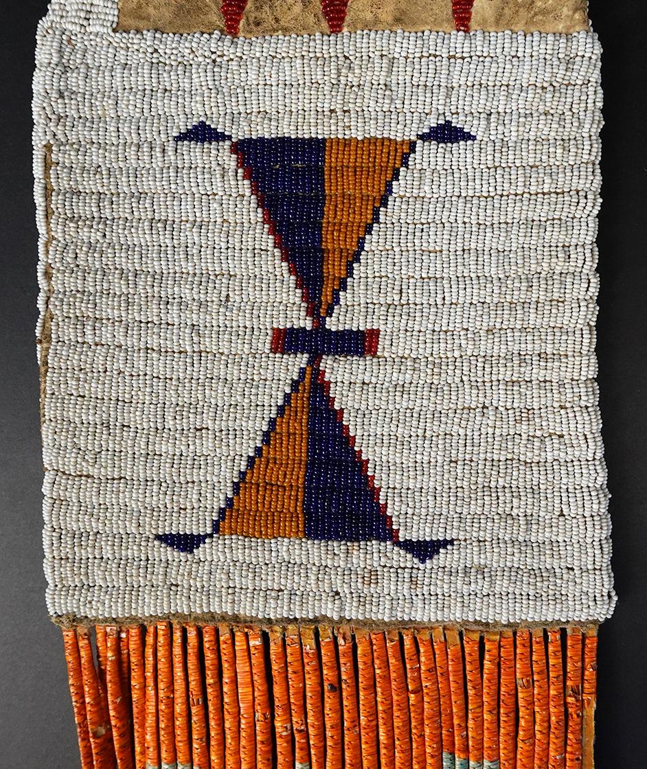 Circa 1880's Sioux or Cheyenne Pipe Bag that is 25" long. No bead loss. Very collectible!