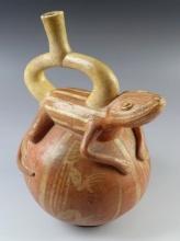 7 1/2" x 9 1/2" tall Moche Culture Lizard Effigy Stirrup Bottle recovered in South America.