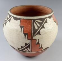 4 1/2" tall by 5" diameter Zia Pottery Vessel. Signed by artist Benina Medina of New Mexico.