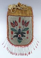 10 3/4" by 6 3/4" Umatilla (Plateau culture) Beaded Bag with an arrow and floral design.