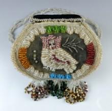 6" tall by 6 3/4" long by 5 1/2" wide Iroquois Beaded Purse with owl motif on each side.